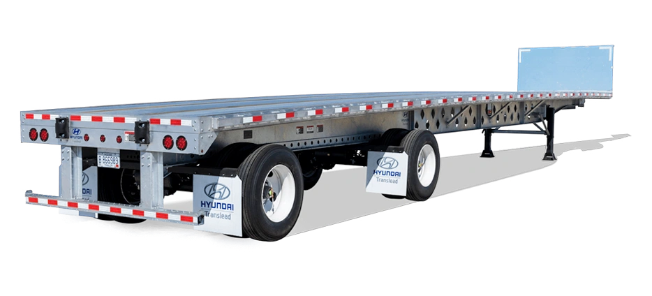 Hyundai Translead flatbed trailer with aluminum deck and steel frame parked on display lot